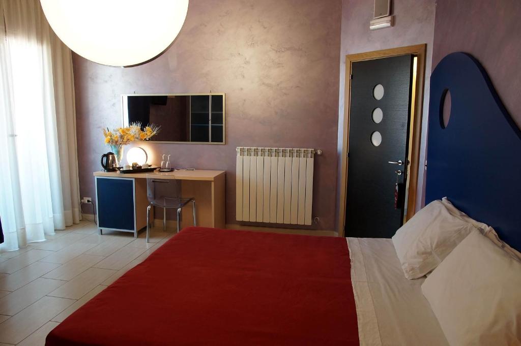 Postel nebo postele na pokoji v ubytování B&B Alixia