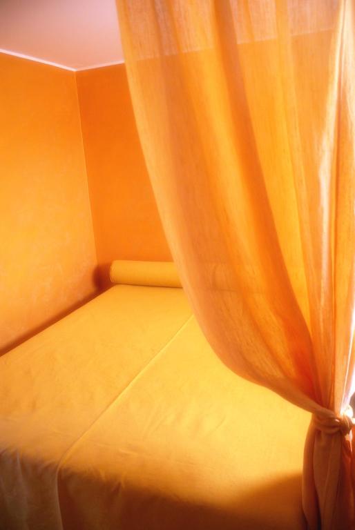 Postel nebo postele na pokoji v ubytování B&B Alixia