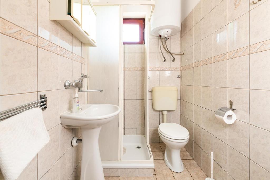 Kúpeľňa v ubytovaní Apartman Petelin