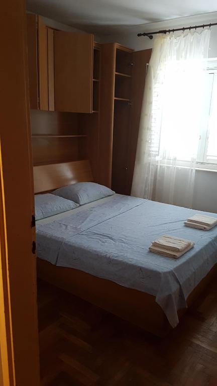 Postel nebo postele na pokoji v ubytování GORAN'S PLACE