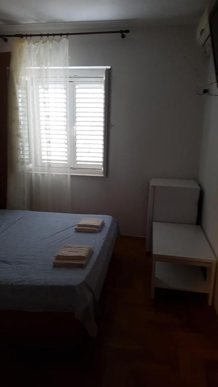 Postel nebo postele na pokoji v ubytování GORAN'S PLACE