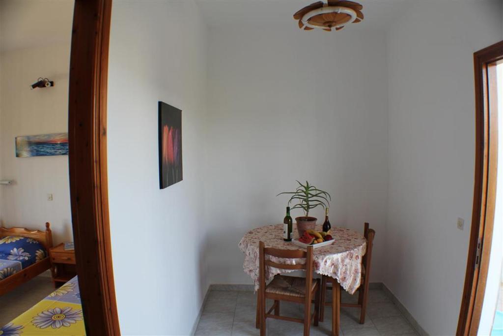 Postel nebo postele na pokoji v ubytování Nikolas House