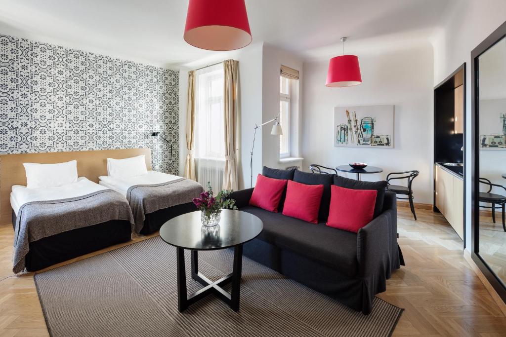 Postel nebo postele na pokoji v ubytování Neiburgs Hotel