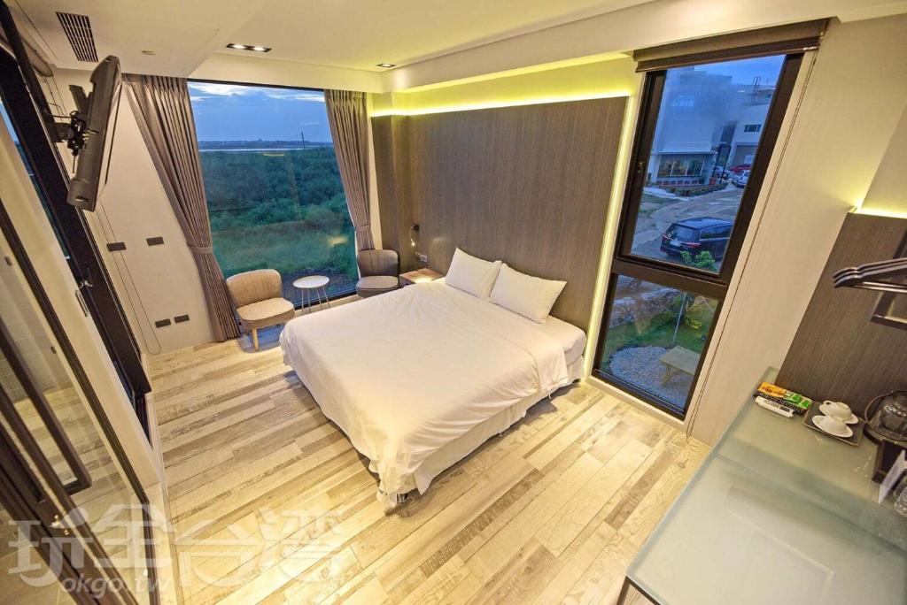 Postel nebo postele na pokoji v ubytování O2 Homestay