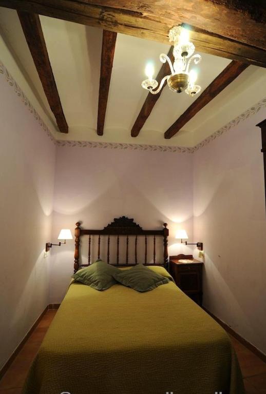 Postel nebo postele na pokoji v ubytování Casa Estivill