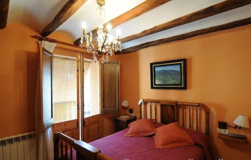 Postel nebo postele na pokoji v ubytování Casa Estivill
