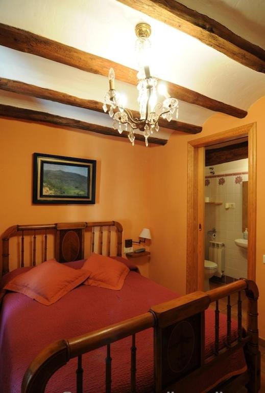Postel nebo postele na pokoji v ubytování Casa Estivill