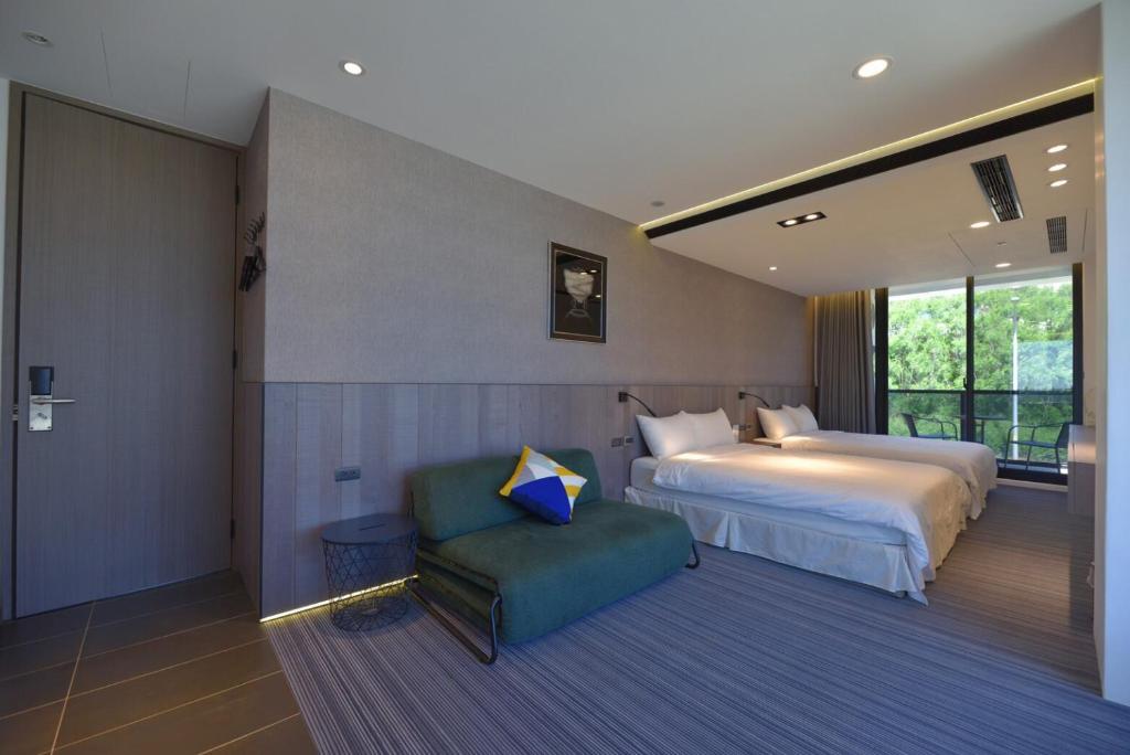 Postel nebo postele na pokoji v ubytování O2 Homestay