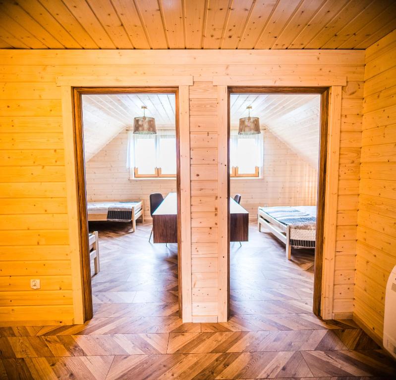 Posteľ alebo postele v izbe v ubytovaní Kraina Dauby