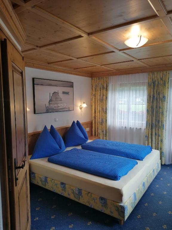 Postel nebo postele na pokoji v ubytování Gasthof Finkenhof