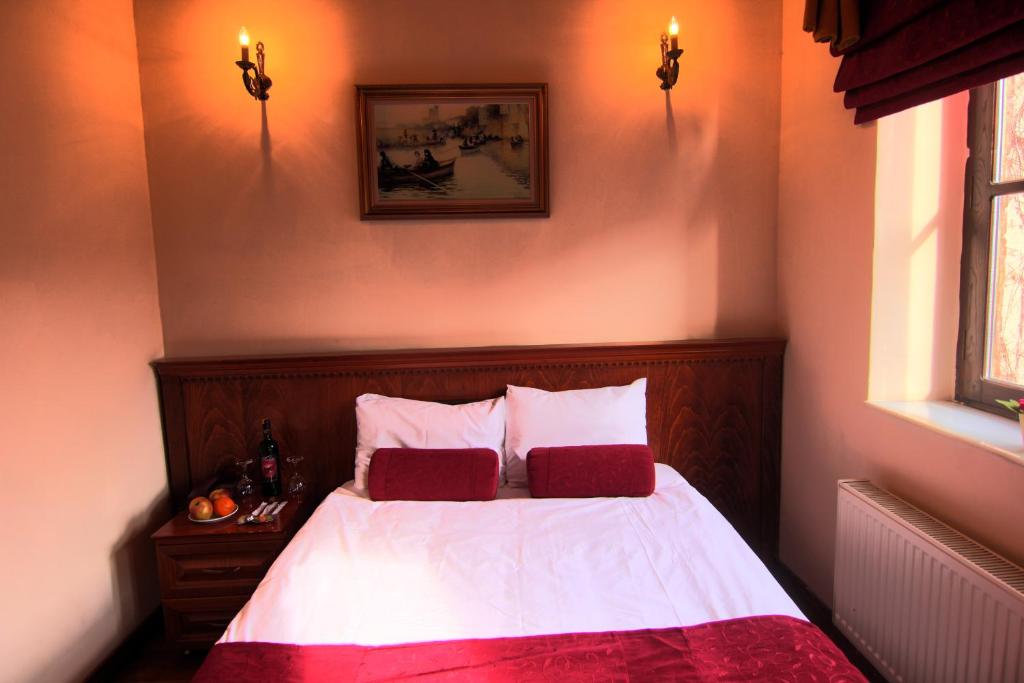 Postel nebo postele na pokoji v ubytování Kervansaray Canakkale Hotel - Special Category