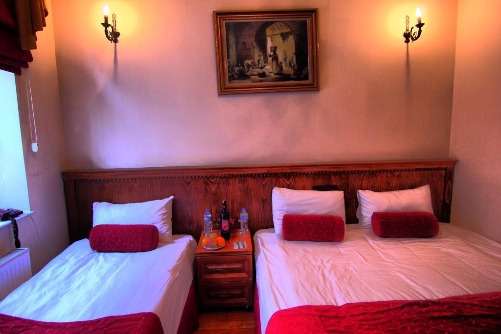 Postel nebo postele na pokoji v ubytování Kervansaray Canakkale Hotel - Special Category
