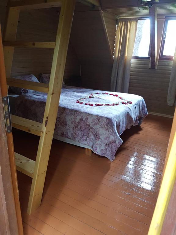 Postel nebo postele na pokoji v ubytování Rannakodu