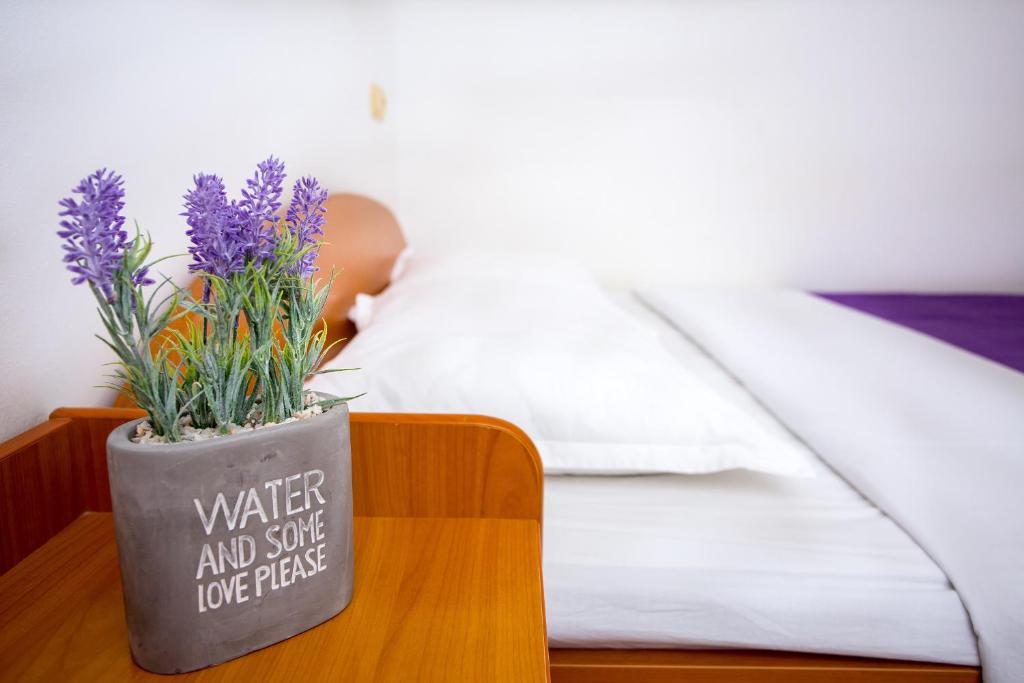 Postel nebo postele na pokoji v ubytování AGA beach suites