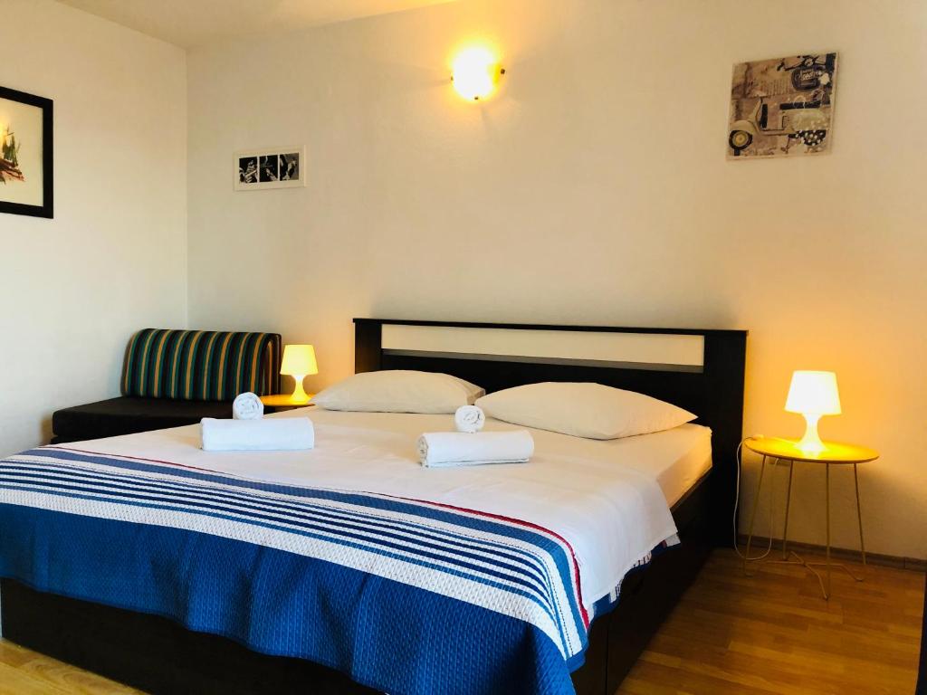 Postel nebo postele na pokoji v ubytování Guest House Stipe