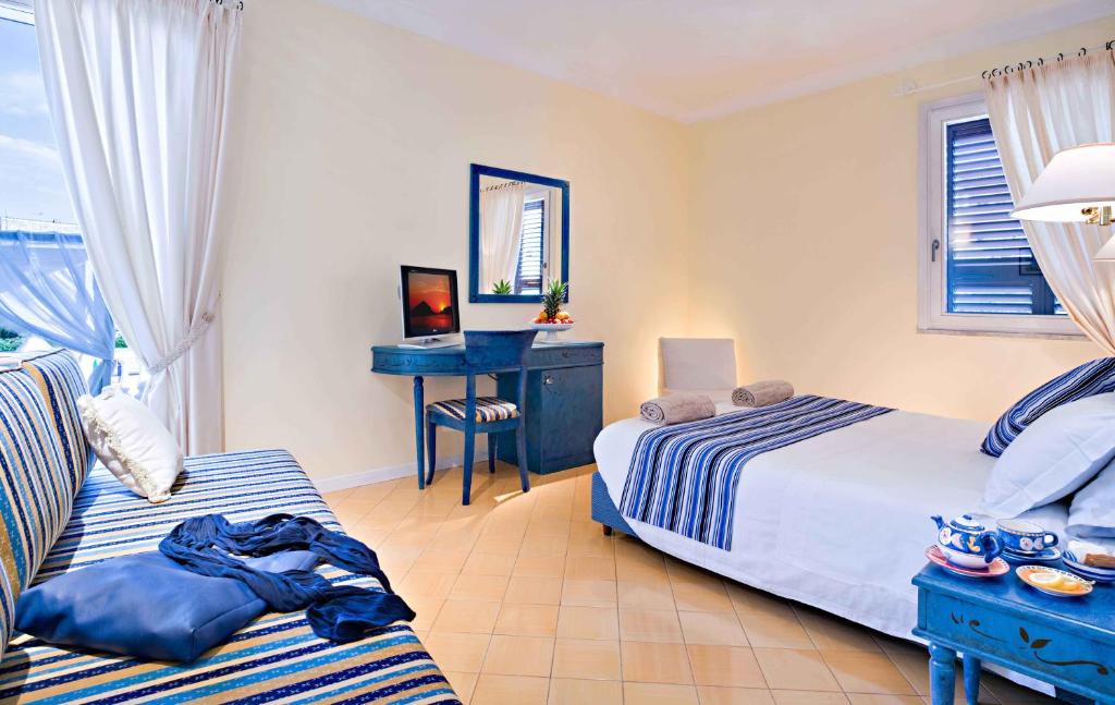 Postel nebo postele na pokoji v ubytování Hotel Mare Blu Terme
