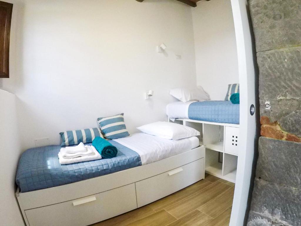 Postel nebo postele na pokoji v ubytování 7 Bridges Apartment