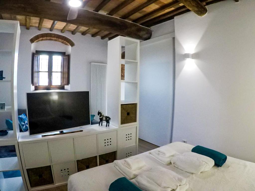 Postel nebo postele na pokoji v ubytování 7 Bridges Apartment