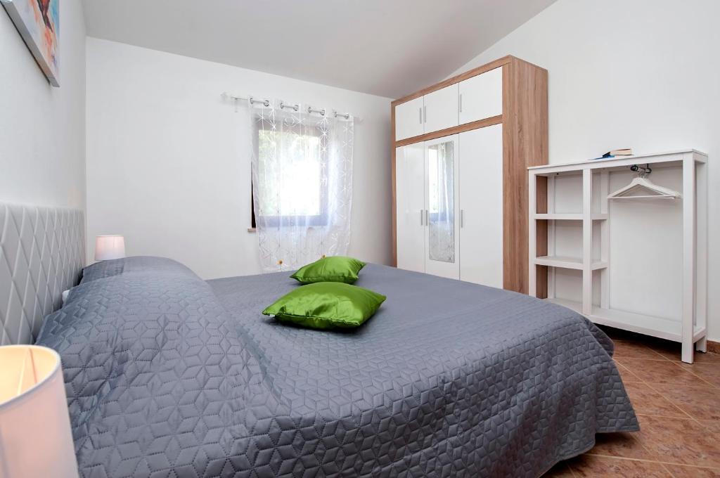 A bed or beds in a room at Casa ValeLuna Rovinj