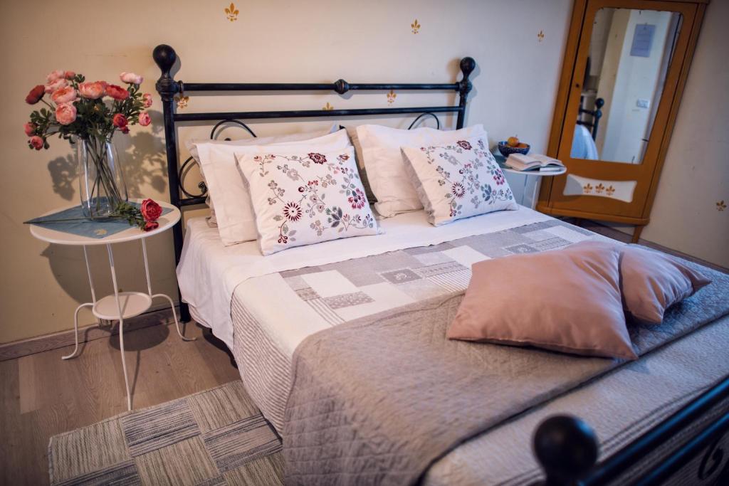Postel nebo postele na pokoji v ubytování B&B Cascina Ciapilau