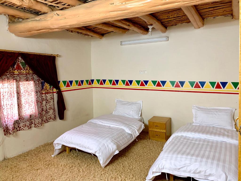 Voodi või voodid majutusasutuse بيت القرية التراثية toas