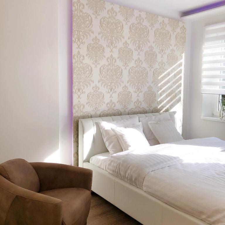 Postel nebo postele na pokoji v ubytování VIP 67