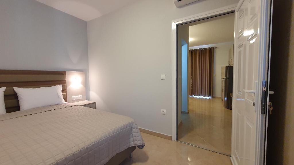 Posteľ alebo postele v izbe v ubytovaní Vasiliki House