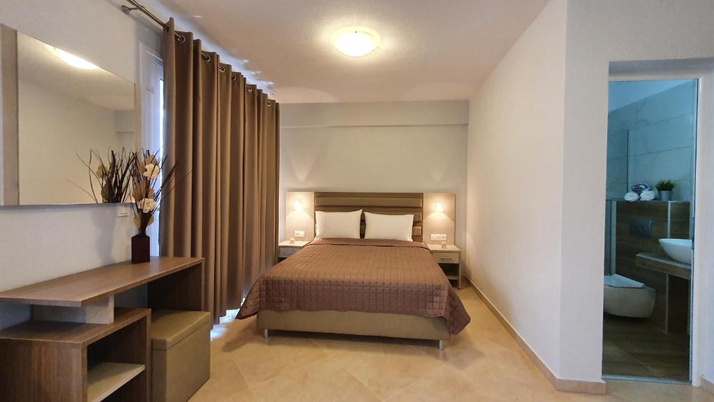Posteľ alebo postele v izbe v ubytovaní Vasiliki House