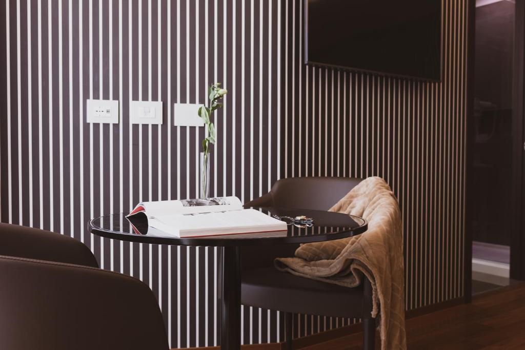 TV a/nebo společenská místnost v ubytování Callistos Hotel & Spa