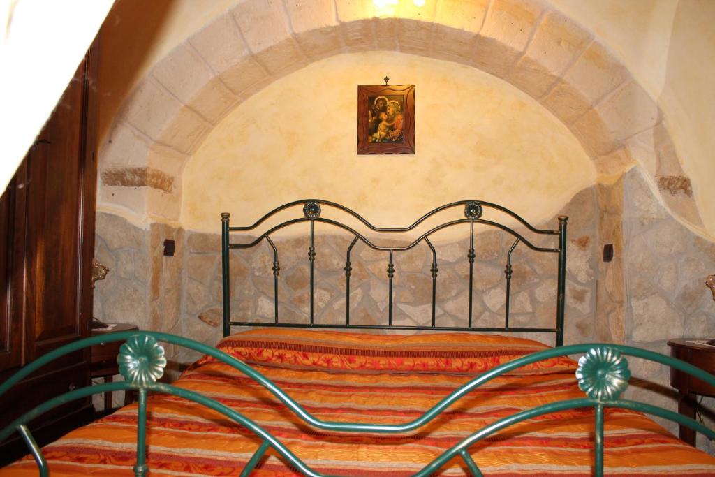 Postel nebo postele na pokoji v ubytování Domusfrumenti