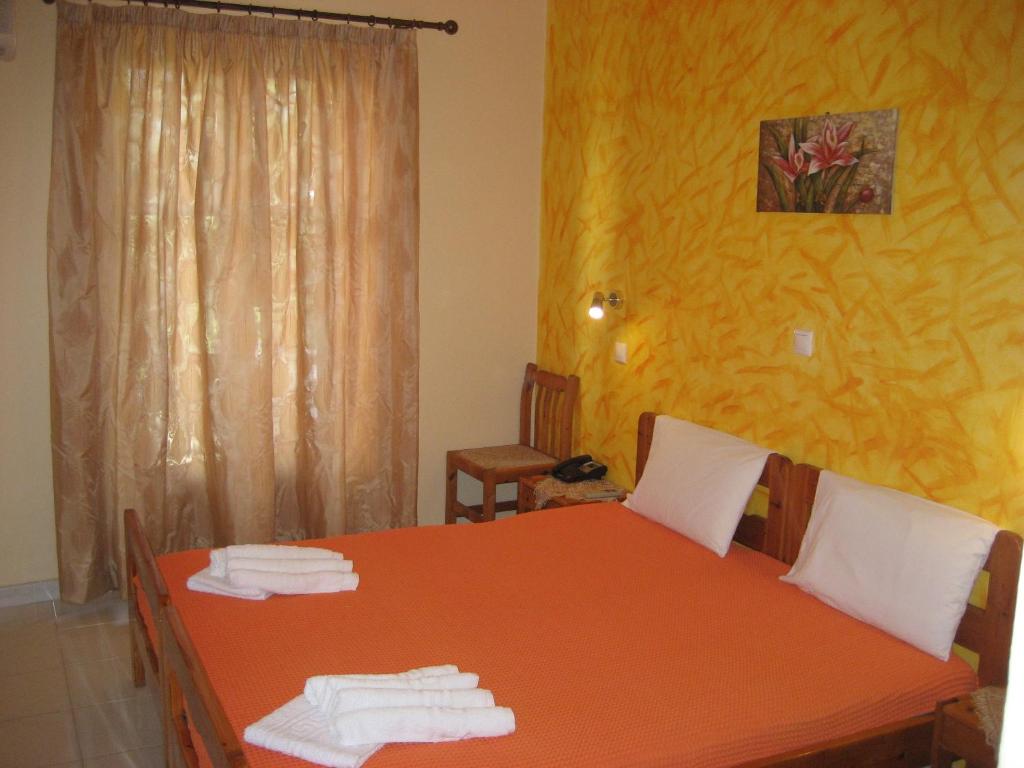 Postel nebo postele na pokoji v ubytování Thalia Hotel