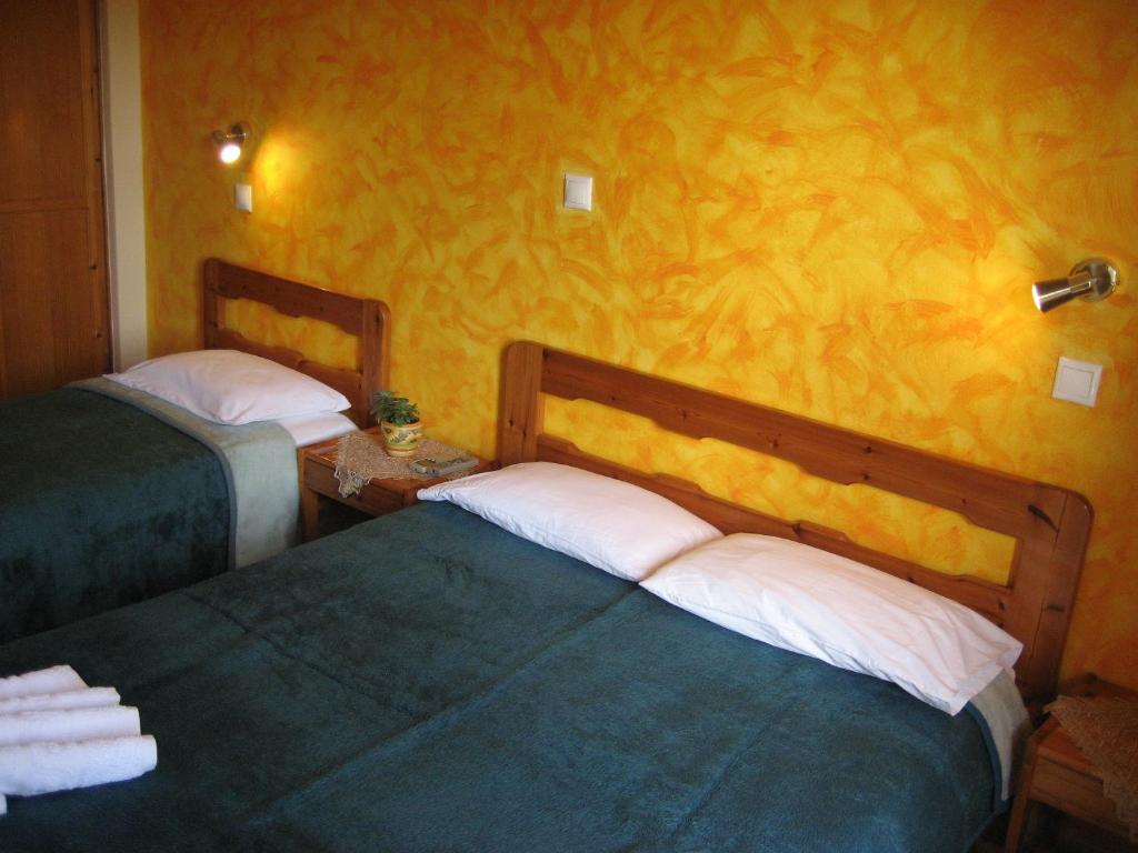 Postel nebo postele na pokoji v ubytování Thalia Hotel