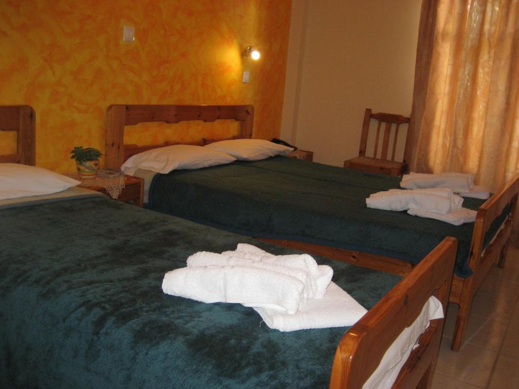 Postel nebo postele na pokoji v ubytování Thalia Hotel