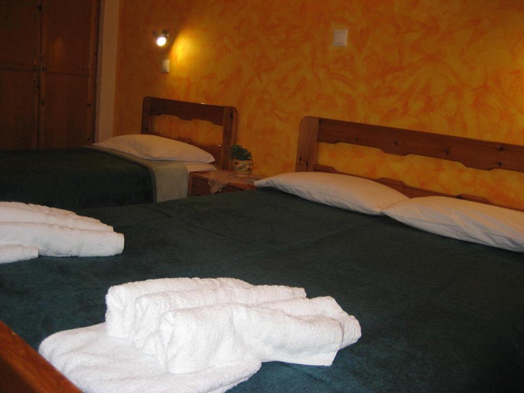 Postel nebo postele na pokoji v ubytování Thalia Hotel