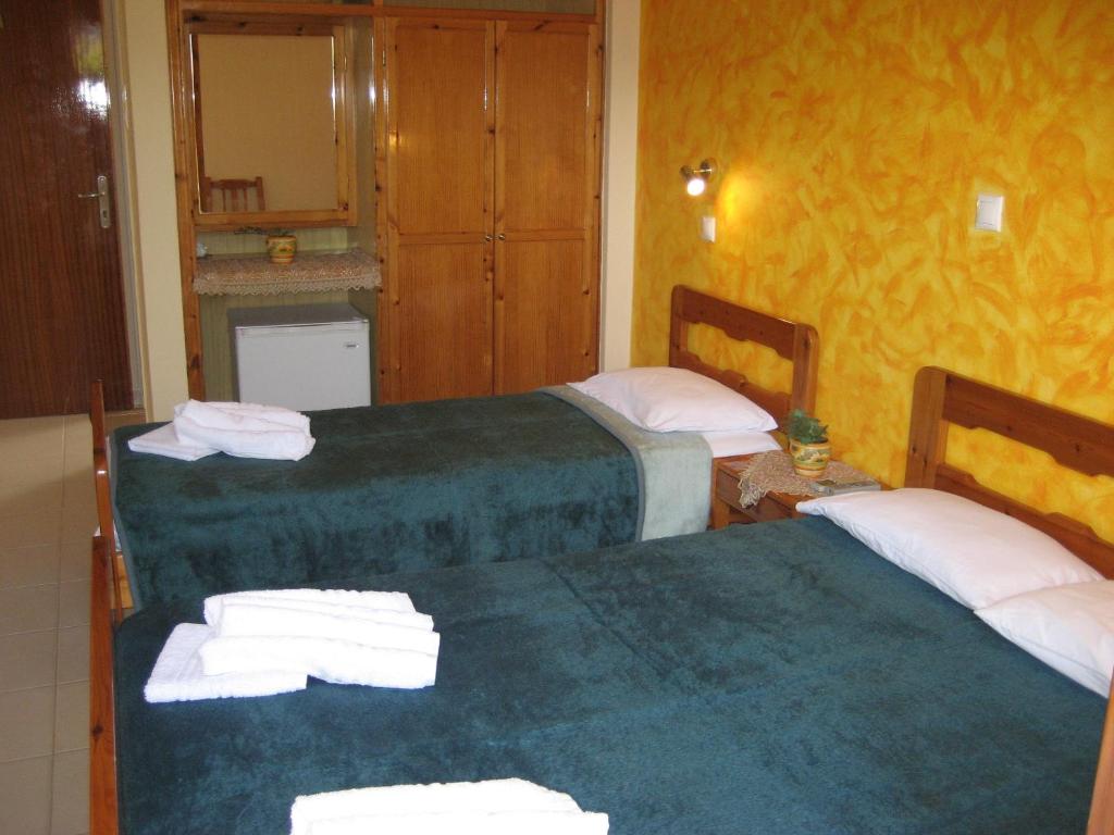 Postel nebo postele na pokoji v ubytování Thalia Hotel