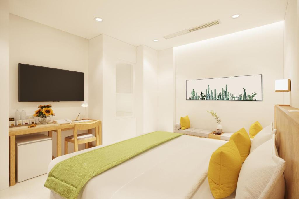 TV a/nebo společenská místnost v ubytování The Pearl Hotel