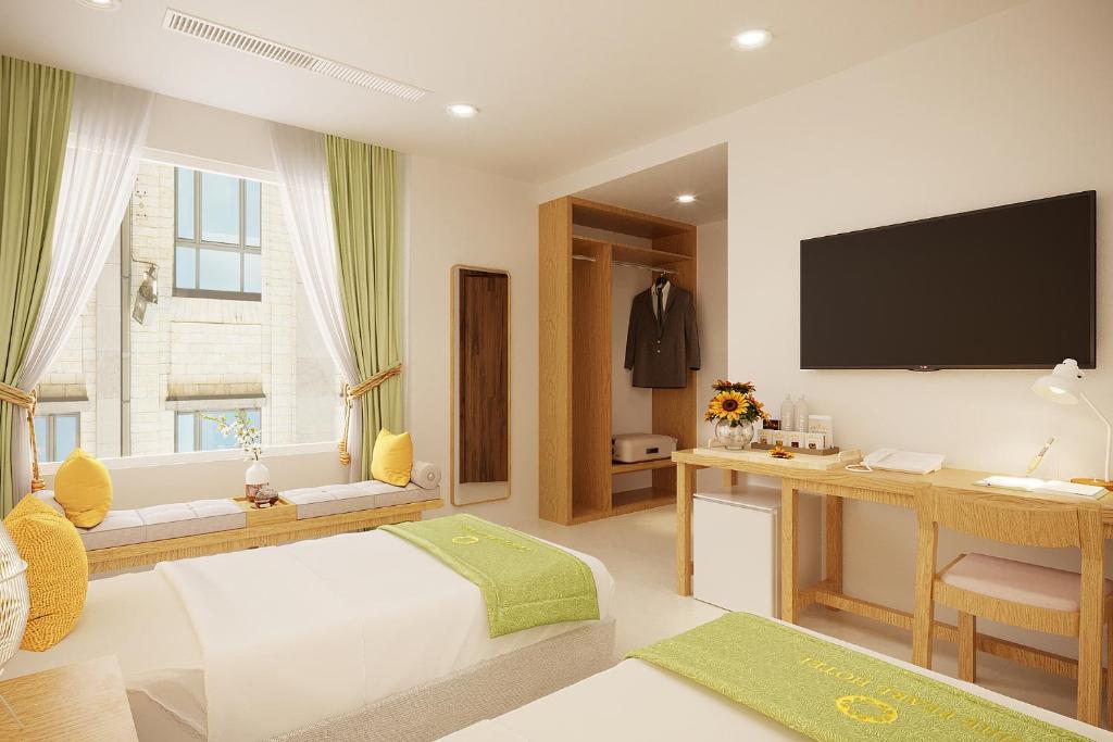 TV a/nebo společenská místnost v ubytování The Pearl Hotel