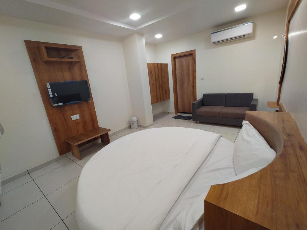 TV a/nebo společenská místnost v ubytování Hotel Neelkamal
