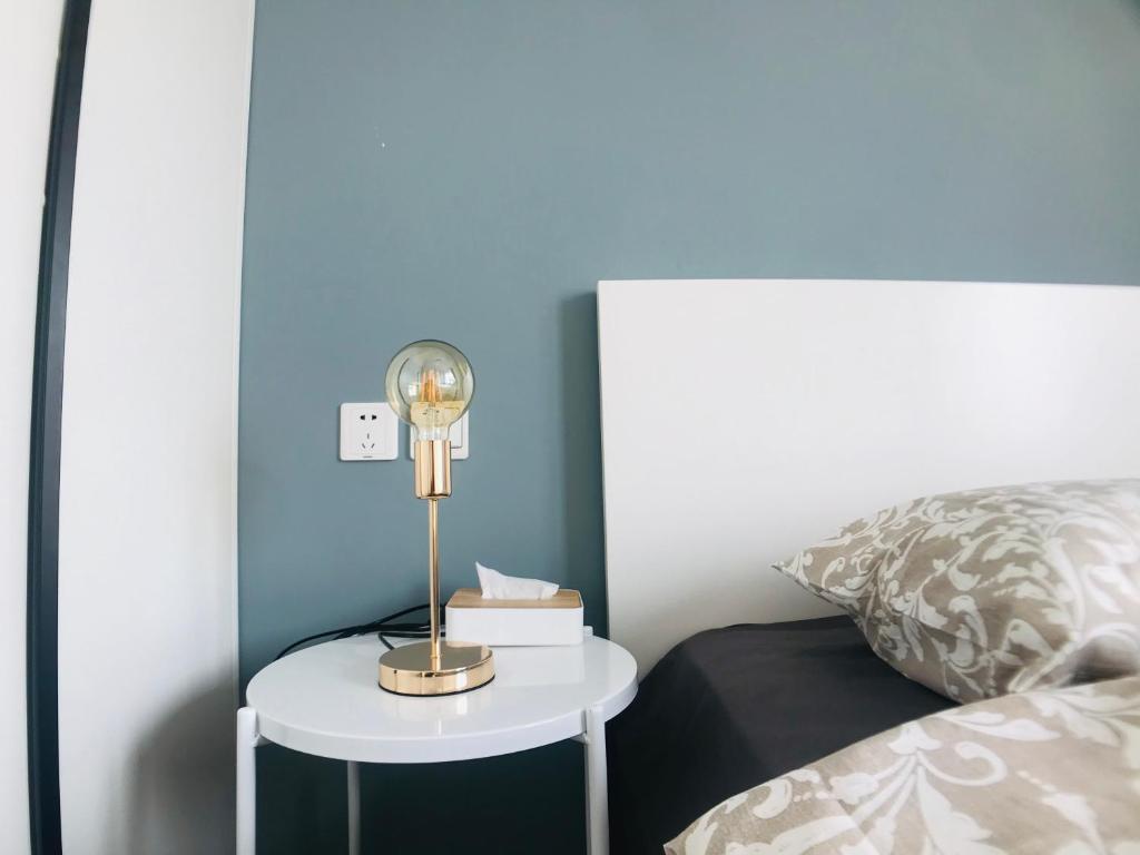 Postel nebo postele na pokoji v ubytování Zhe·Yi Boutique Guesthouse