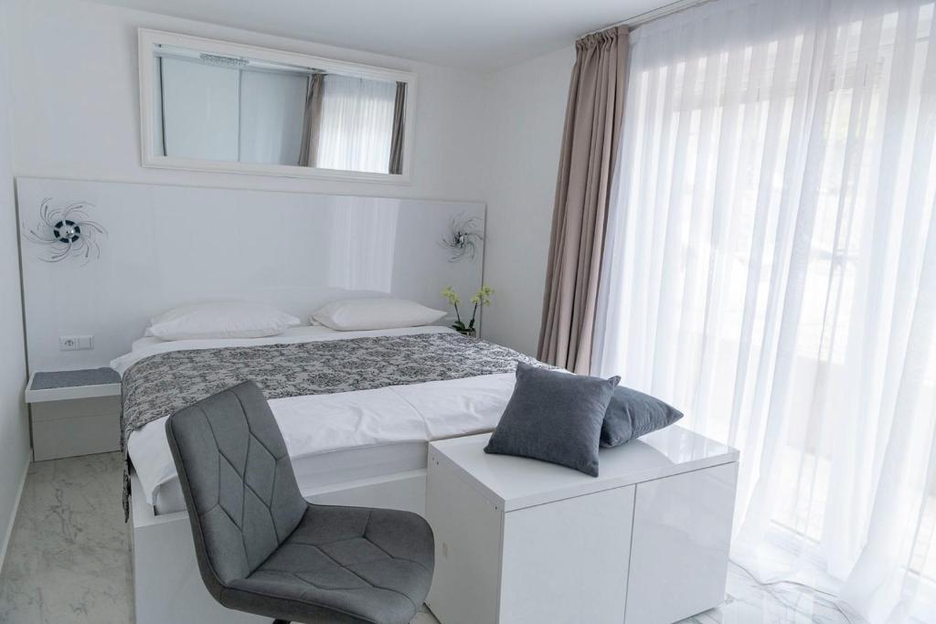 Posteľ alebo postele v izbe v ubytovaní Apartments Petra Krk