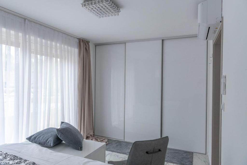 Posteľ alebo postele v izbe v ubytovaní Apartments Petra Krk