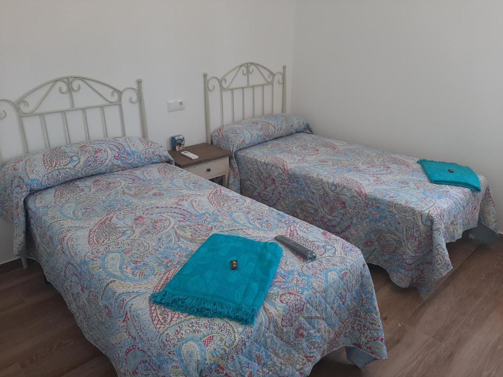 Posteľ alebo postele v izbe v ubytovaní LUXURY VILLA DOÑA BELLA