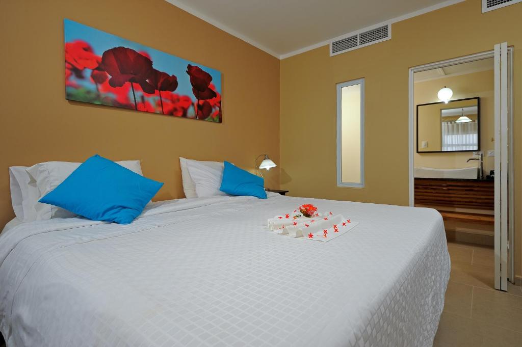 Postel nebo postele na pokoji v ubytování Eden Beach Resort - Bonaire