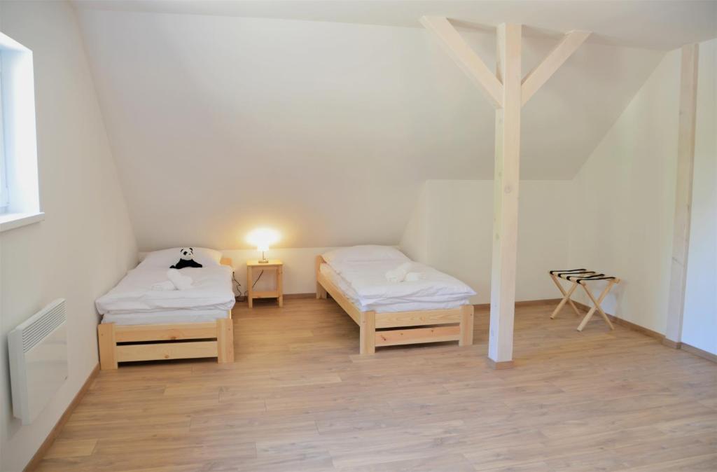 Postel nebo postele na pokoji v ubytování Resort Erich