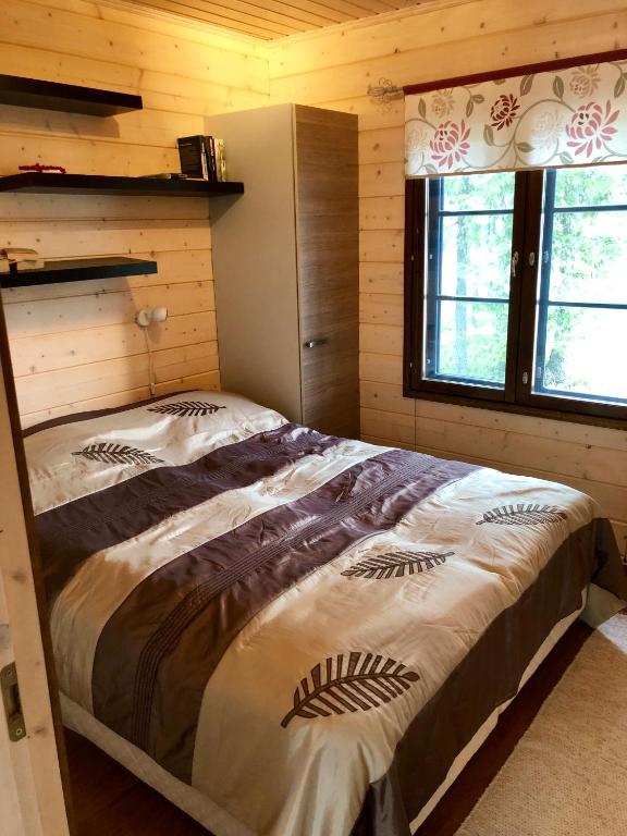 Postel nebo postele na pokoji v ubytování Holiday Home Tokka at Iso-Syöte