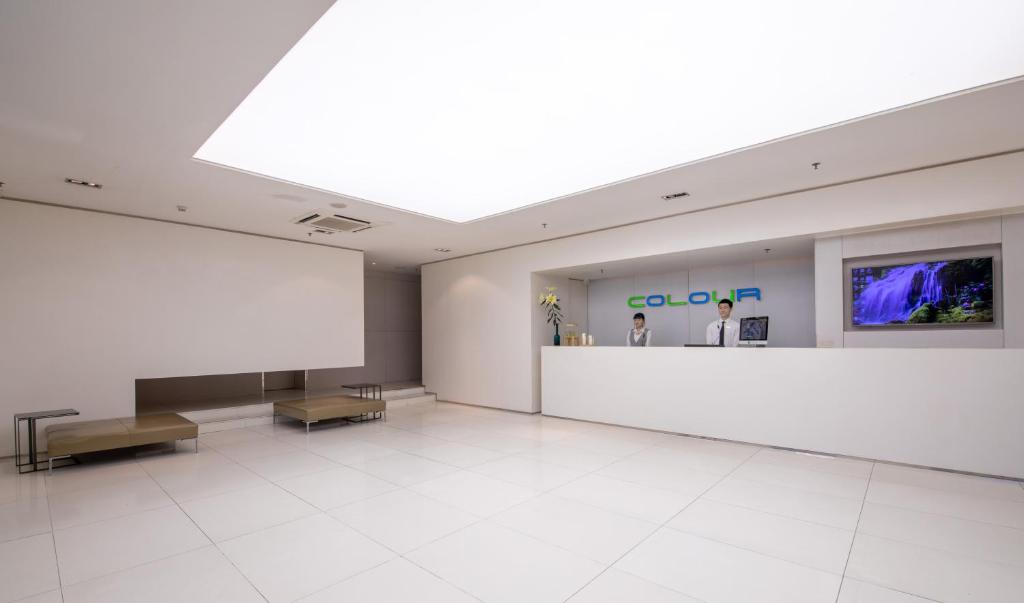 TV a/nebo společenská místnost v ubytování Shenzhen Dongmen Colour Hotel
