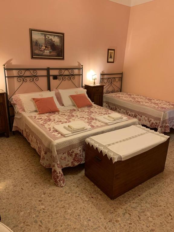 Posteľ alebo postele v izbe v ubytovaní Casa del Capitano Rocca d'Orcia