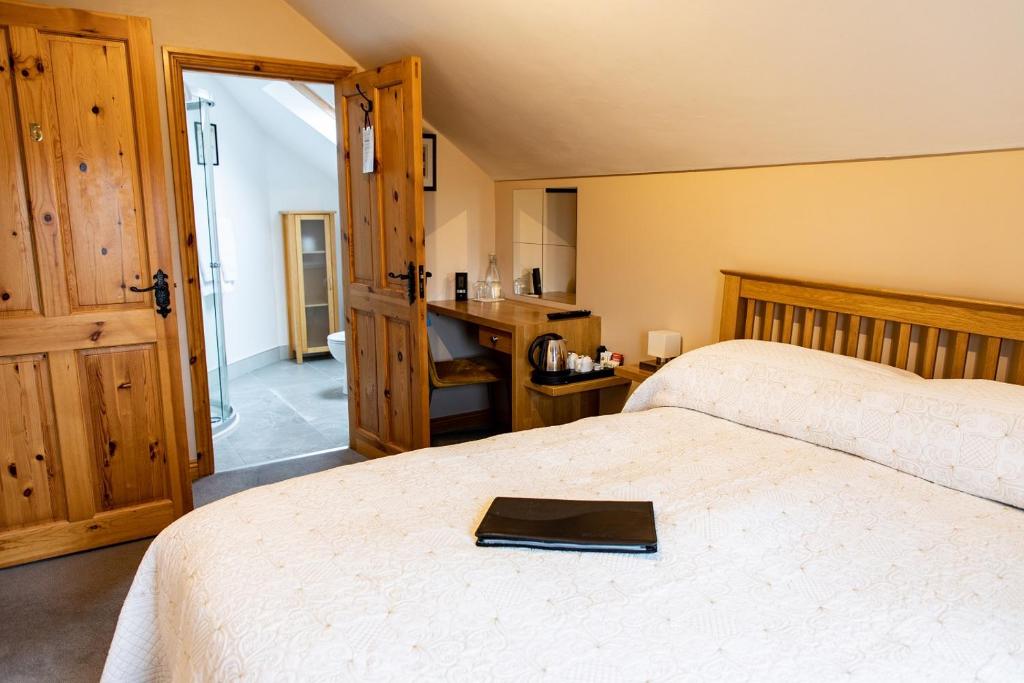Postel nebo postele na pokoji v ubytování Twin Peaks B&B