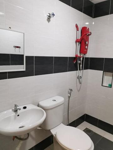 Koupelna v ubytování LH Hotel Langkap Perak