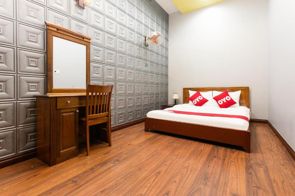 Postel nebo postele na pokoji v ubytování Honey Hotel Da Nang